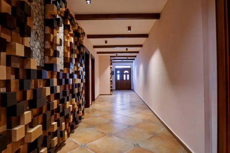 Hotel lobby with a framed cubic wooden panel with picture inserts